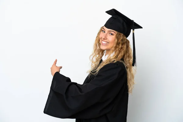 Graduação Universitária Jovem Isolado Fundo Branco Apontando Para Trás — Fotografia de Stock