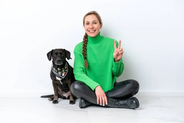 Young Caucasian Woman Sitting Floor His Puppy Isolated White Background — Fotografia de Stock