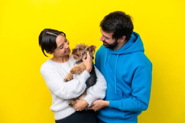 Young Caucasian Couple Holding Dog — Stockfoto