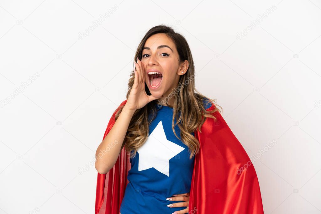 Super Hero woman over isolated white background shouting with mouth wide open