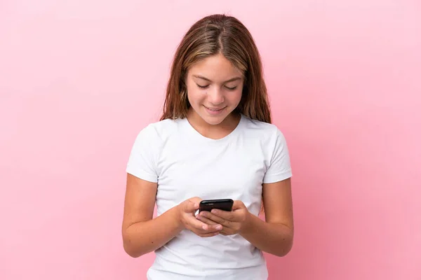 Little Caucasian Girl Isolated Pink Background Sending Message Mobile — Foto Stock