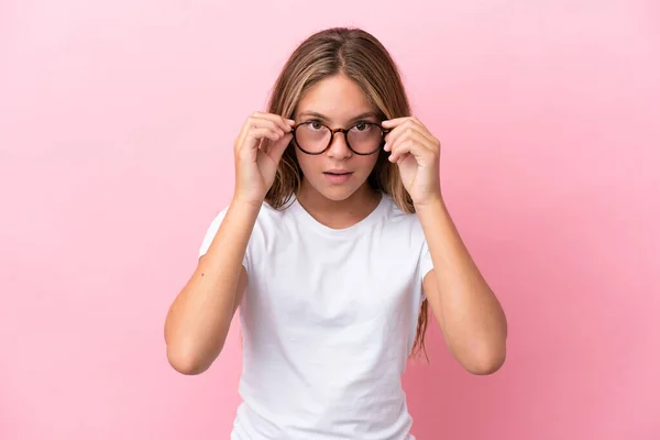 Little Caucasian Girl Isolated Pink Background Glasses Surprised Expression — Stok fotoğraf