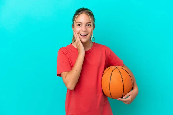 Little Caucasian Girl Playing Basketball Isolated Blue Background Surprise Shocked — Fotografia de Stock