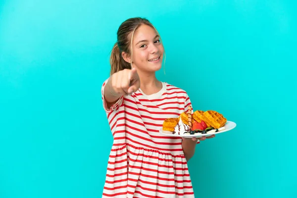 Little Caucasian Girl Holding Waffles Isolated Blue Background Pointing Front — Foto de Stock