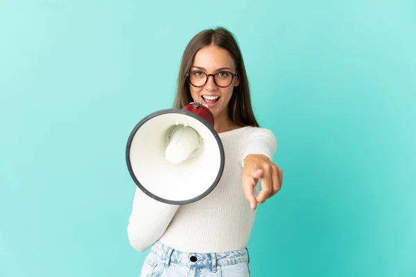 Young Woman Isolated Blue Background Shouting Megaphone Announce Something While —  Fotos de Stock