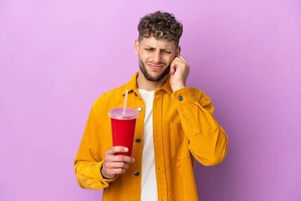 Young Blonde Man Holding Soda Isolated Purple Background Frustrated Covering — 스톡 사진