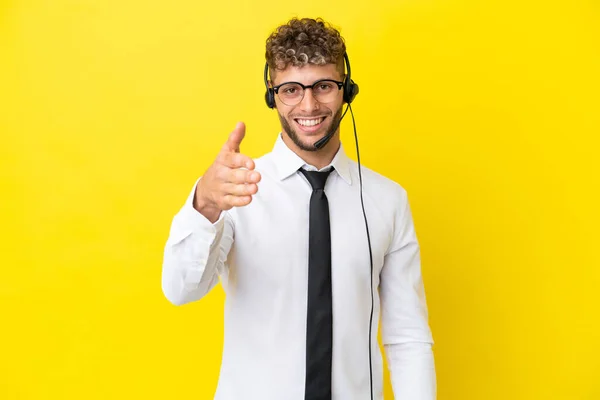 Telemarketer Blonde Man Working Headset Isolated Yellow Background Shaking Hands — Stock fotografie