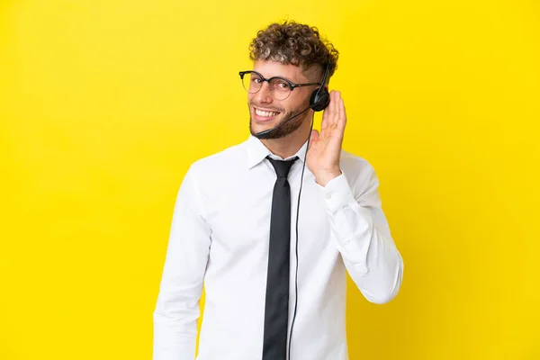 Telemarketer Blonde Man Working Headset Isolated Yellow Background Listening Something — Stock fotografie