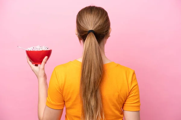 Young Caucasian Woman Holding Bowl Cereals Isolated Pink Background Back — Stock fotografie