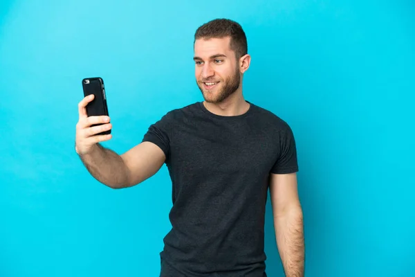 Young Handsome Caucasian Man Isolated Blue Background Making Selfie —  Fotos de Stock