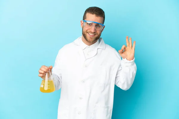Young Caucasian Scientific Man Isolated Blue Background Showing Sign Fingers — 스톡 사진
