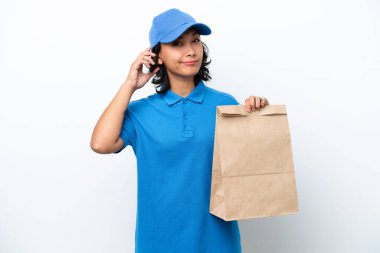 Young argentinian delivery woman isolated on white background 