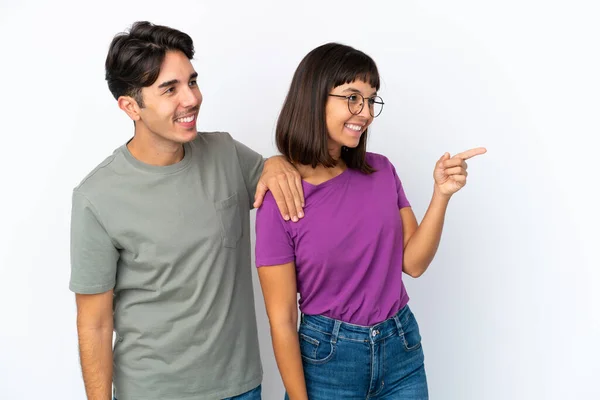 Young Couple Isolated Isolated White Background Pointing Side Present Product — Fotografia de Stock