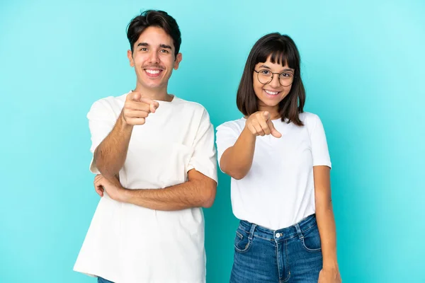 Young Mixed Race Couple Isolated Blue Background Points Finger You — Foto Stock