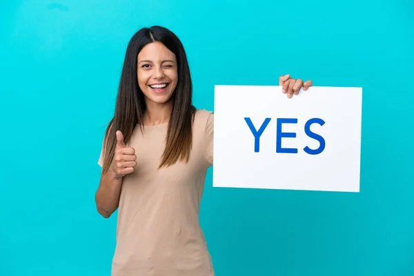 Young Woman Isolated Background Holding Placard Text Yes Pointing Front — Stockfoto