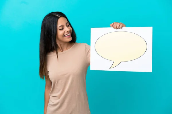 Young Woman Isolated Background Holding Placard Speech Bubble Icon — Photo