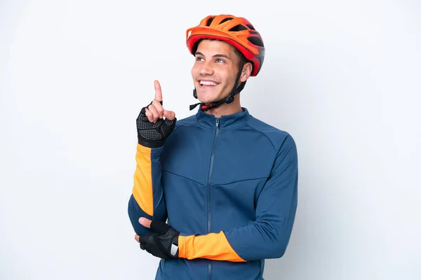Joven Ciclista Caucásico Aislado Sobre Fondo Blanco Apuntando Una Gran —  Fotos de Stock