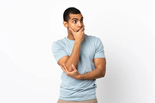 African American Man Isolated White Background Doing Surprise Gesture While — Zdjęcie stockowe
