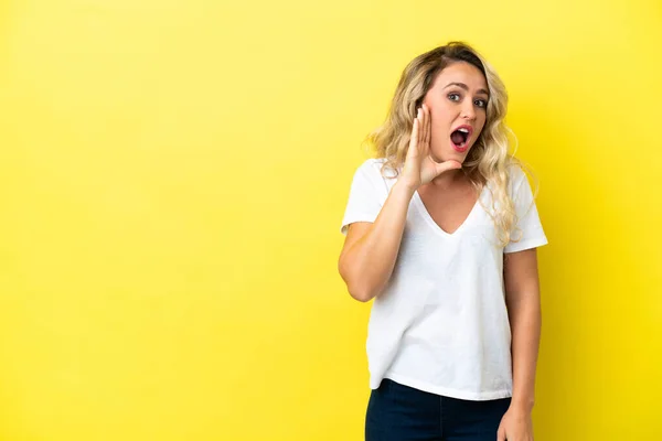 Young Brazilian Woman Isolated Yellow Background Shouting Mouth Wide Open — стоковое фото