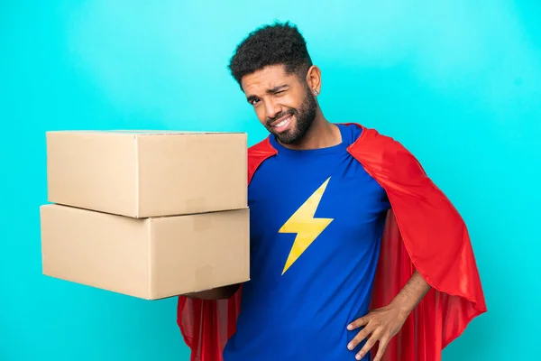 Super Hero Delivery Brazilian Man Isolated Blue Background Suffering Backache — Stock Photo, Image