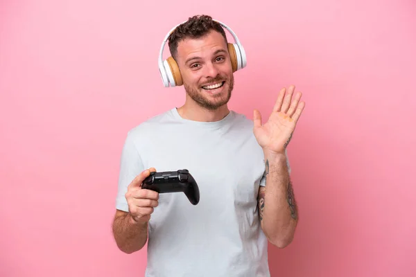 Young Brazilian Man Playing Video Game Controller Isolated Pink Background — Fotografia de Stock