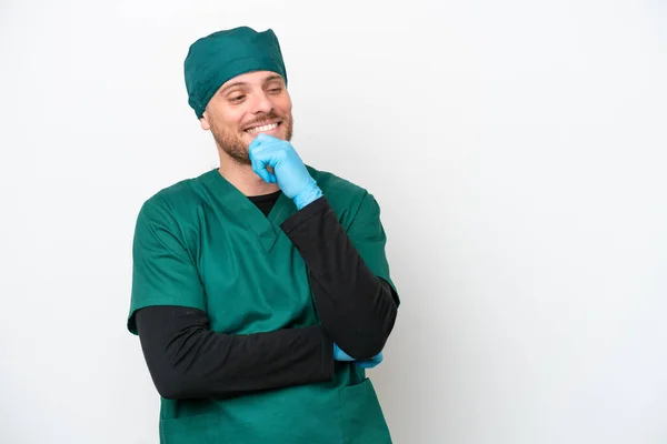 Surgeon Brazilian Man Green Uniform Isolated White Background Looking Side — Stockfoto