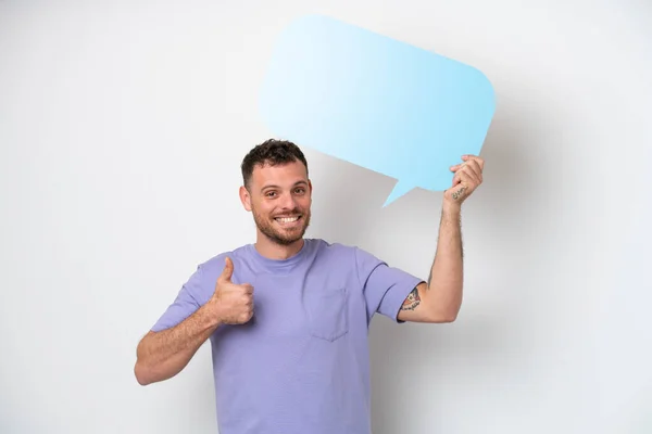 Young Brazilian Man Isolated White Background Holding Empty Speech Bubble — Stok fotoğraf