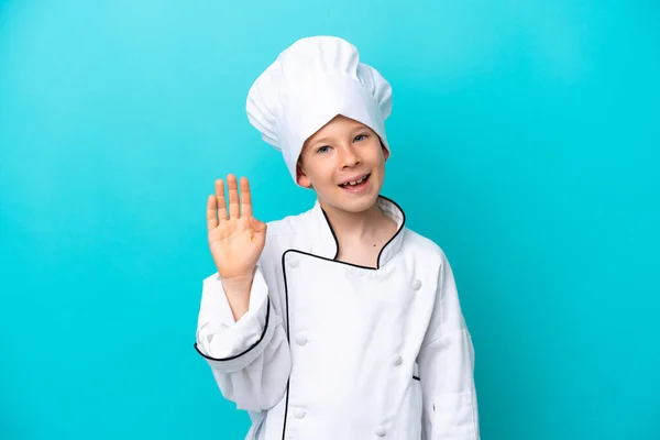 Piccolo Chef Ragazzo Isolato Sfondo Blu Saluto Con Mano Con — Foto Stock