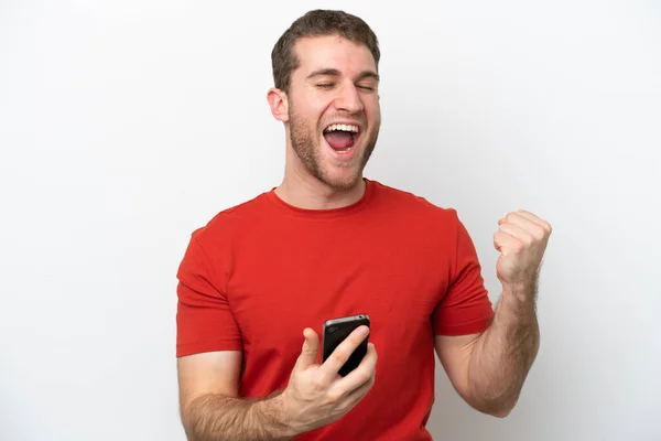 Joven Hombre Caucásico Aislado Sobre Fondo Blanco Con Teléfono Posición —  Fotos de Stock