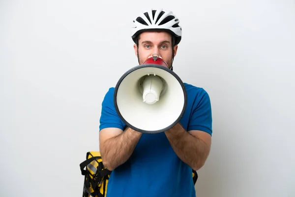 Young Caucasian Man Thermal Backpack Isolated White Background Shouting Megaphone — Stock Photo, Image