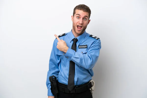 Young Police Caucasian Man Isolated White Background Surprised Pointing Side — Stockfoto