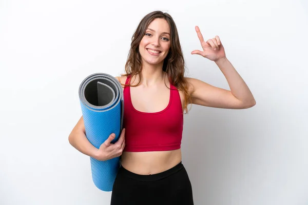 Joven Mujer Caucásica Deportiva Yendo Clases Yoga Mientras Sostiene Una —  Fotos de Stock