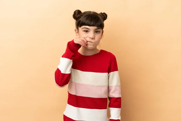 Little Caucasian Girl Isolated Beige Background Showing Sign Silence Gesture — Stock Photo, Image