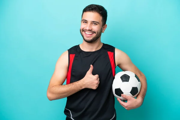 Jonge Voetballer Braziliaanse Man Geïsoleerd Blauwe Achtergrond Geven Van Een — Stockfoto