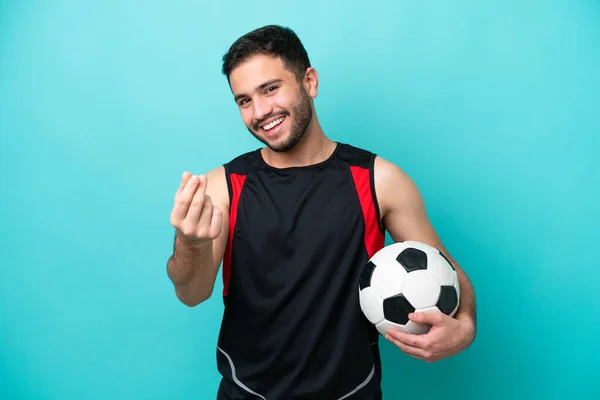 Jonge Voetballer Braziliaanse Man Geïsoleerd Blauwe Achtergrond Geld Verdienen Gebaar — Stockfoto