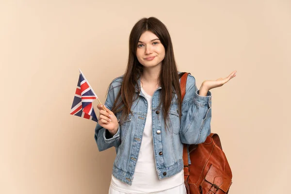 Young Ukrainian Girl Holding United Kingdom Flag Isolated Beige Background — ストック写真