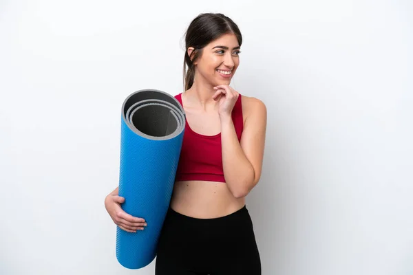 Young Sport Woman Going Yoga Classes While Holding Mat Isolated —  Fotos de Stock