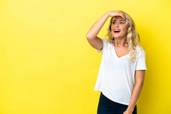 Young Brazilian Woman Isolated Yellow Background Doing Surprise Gesture While —  Fotos de Stock