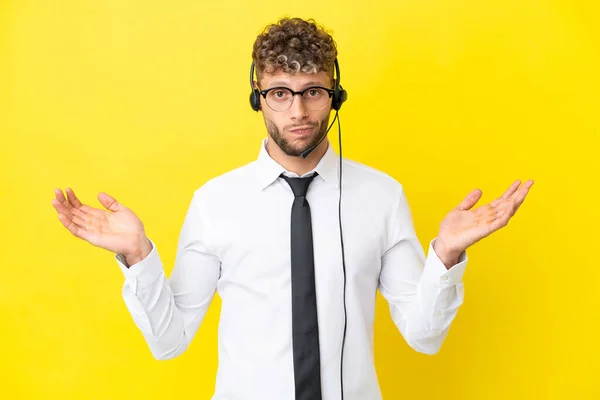 Telemarketer Blonde Man Working Headset Isolated Yellow Background Having Doubts — Zdjęcie stockowe