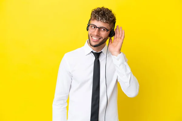 Telemarketer Blonde Man Working Headset Isolated Yellow Background Listening Something — Fotografia de Stock