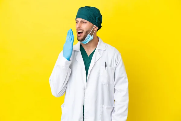 Surgeon Blonde Man Green Uniform Isolated Yellow Background Yawning Covering — 스톡 사진