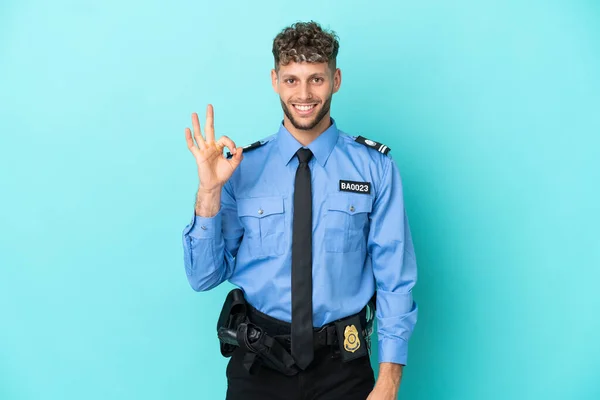 Young Police Blonde Man Isolated White Blue Background Showing Sign —  Fotos de Stock