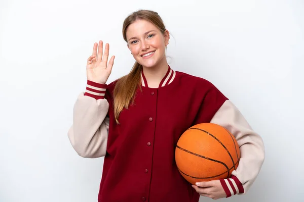 Young Basketball Player Woman Isolated White Background Saluting Hand Happy — ストック写真