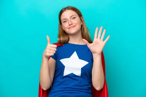 Süper Kahraman Kafkasyalı Kadın Mavi Arka Planda Izole Edilmiş Parmaklarıyla — Stok fotoğraf
