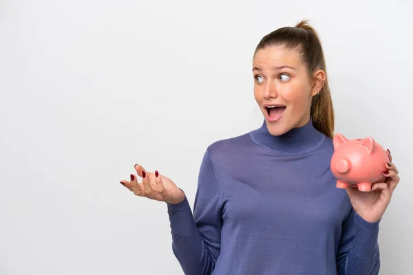 Young Caucasian Woman Holding Piggybank Isolated White Background Surprise Facial — Photo