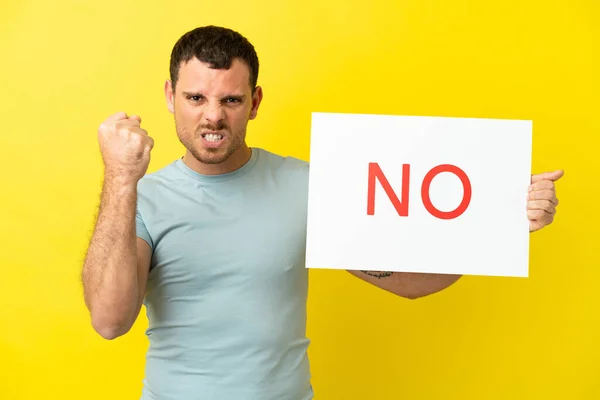 Brazilian Man Isolated Purple Background Holding Placard Text Angry — ストック写真