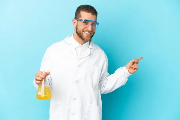 Young Caucasian Scientific Man Isolated Blue Background Pointing Back — 스톡 사진
