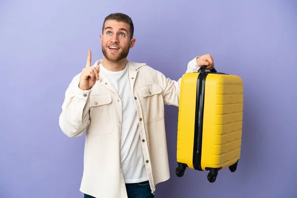 Young Handsome Caucasian Man Isolated Purple Background Vacation Travel Suitcase — Fotografia de Stock