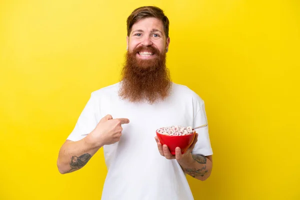 Redhead Man Beard Eating Bowl Cereals Isolated Yellow Background Surprise — Foto de Stock