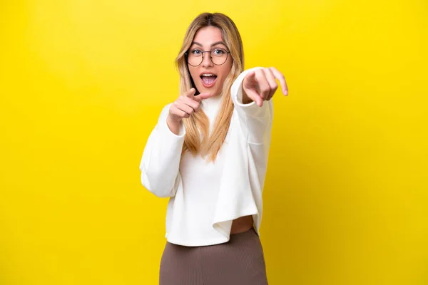 Young Uruguayan Woman Isolated Yellow Background Surprised Pointing Front — 스톡 사진